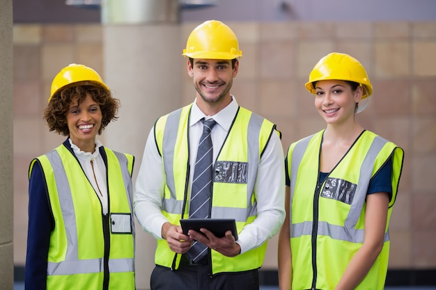 Architects holding digital tablet