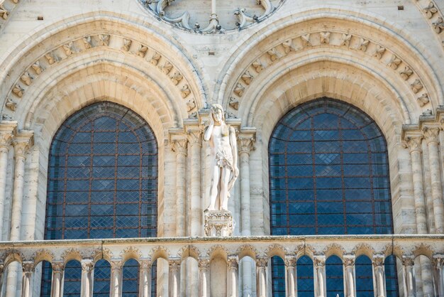 Architectural details on facade of famous cathedral Notre-Dame de Paris. Paris, France before fire April 15, 2019