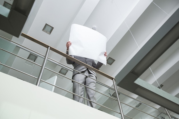 Architectural holding a plan in his hands on a location