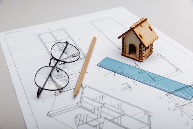 Architectural plan house and glasses