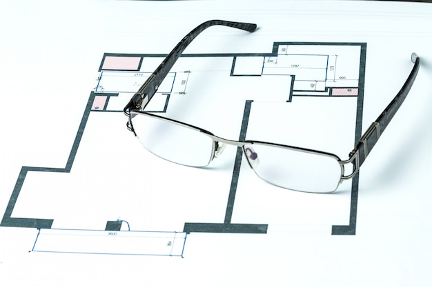 Architectural project and glasses 