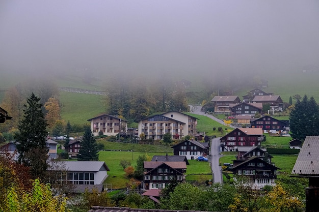 Architecture Buildings with the mist in Lauterbrunnen.