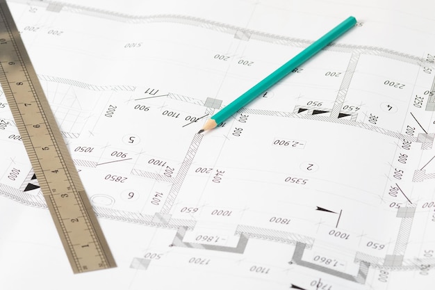 Architecture and construction Workplace of the architectarchitectural project blueprints ruler Top view