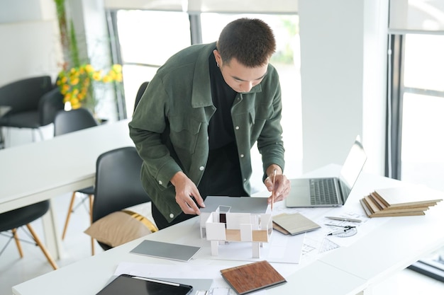 architecture interior man creative project plan designer house model and drawing interior on blueprint