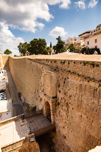 The architecture of the island of Ibiza A charming empty white street in the old town of Eivissa