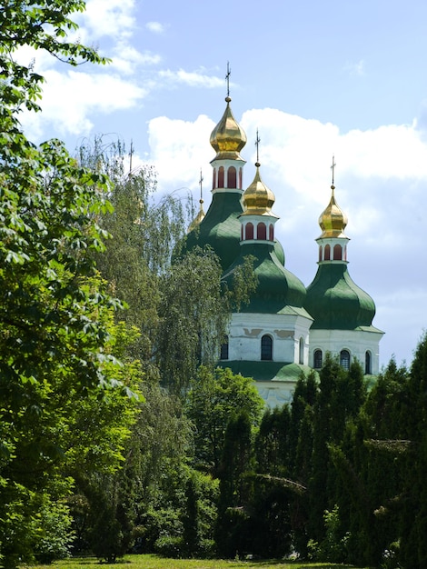 architecture of the old orthodox church on a background of clouds