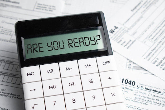 ARE YOU READY word on calculator Business and tax concept Time to pay tax in year