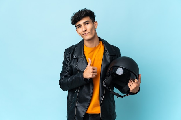 Argentinian man with a motorcycle helmet proud and self-satisfied