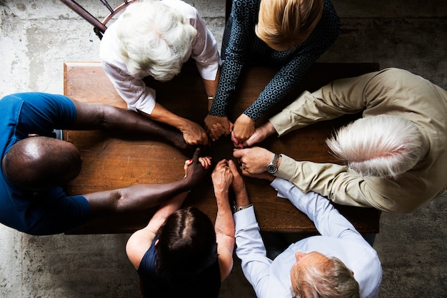 Ariel view of a diverse group of hands 