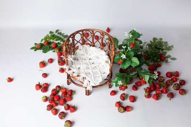 armchair for a photo shoot decorated with strawberries basket for newborn photography background d