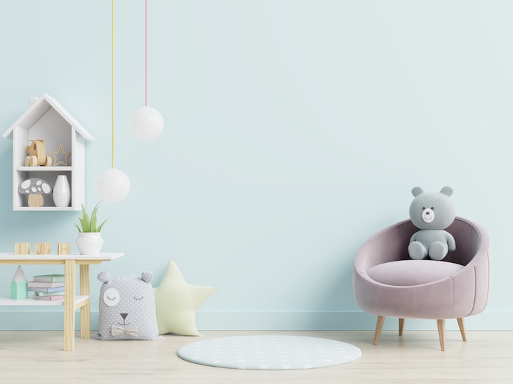 Photo 子供部屋のアームチェアとおもちゃ