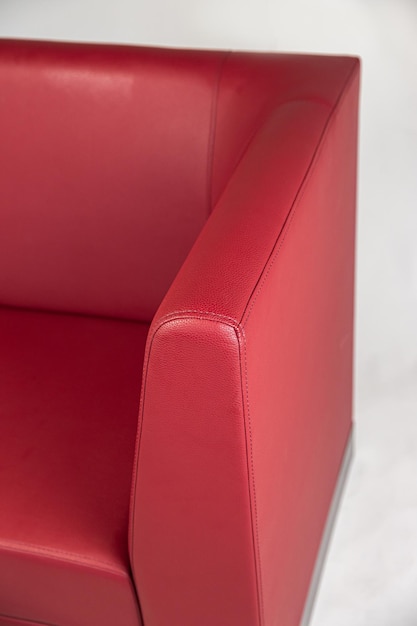 Armchairs with a red leather seat