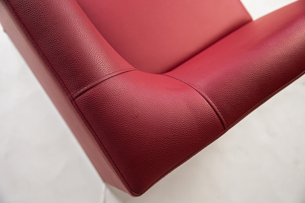 Armchairs with a red leather seat