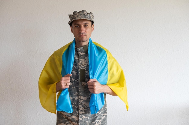 Armed Forces of Ukraine. Ukrainian soldier. Ukrainian in army. Ukrainian flag on military uniform