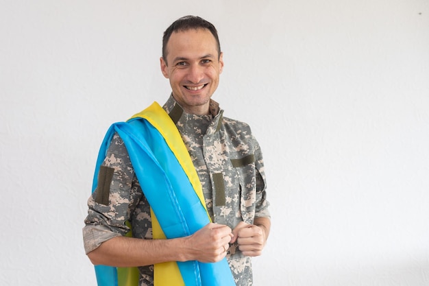 Armed Forces of Ukraine. Ukrainian soldier. Ukrainian in army. Ukrainian flag on military uniform