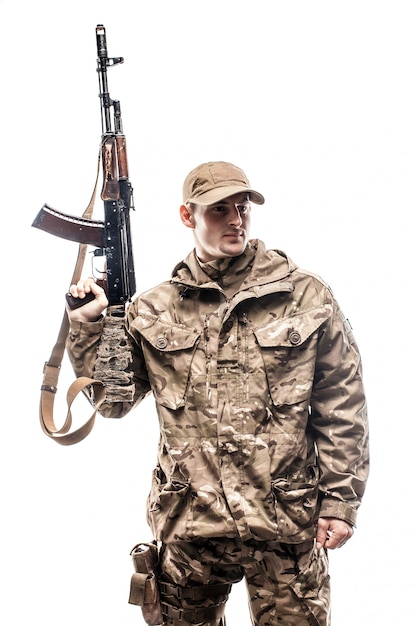 Armed serviceman in uniform