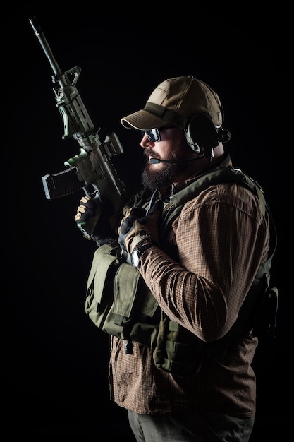 Photo armed soldier ready for battle military concept