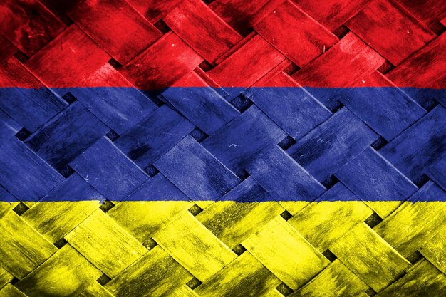 Armenia flag screen on wicker wood background