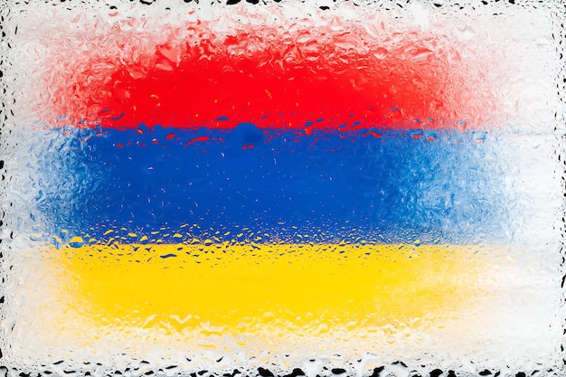 Armenian flag flag of armenia on background of water drops flag with raindrops splashes on glass