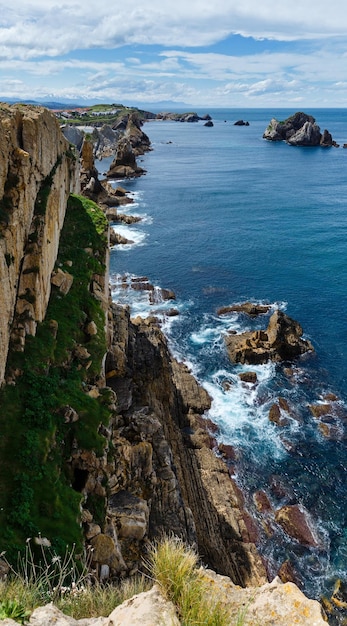 Arnia Beach (Spain). Atlantic Ocean coastline landscape.