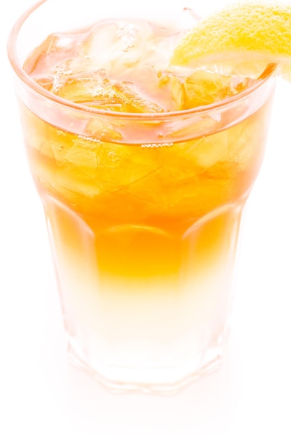 Arnold Palmer cold drink with lemon wedge.