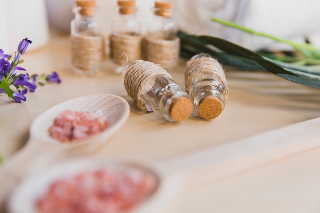 Photo aroma salt near bottles