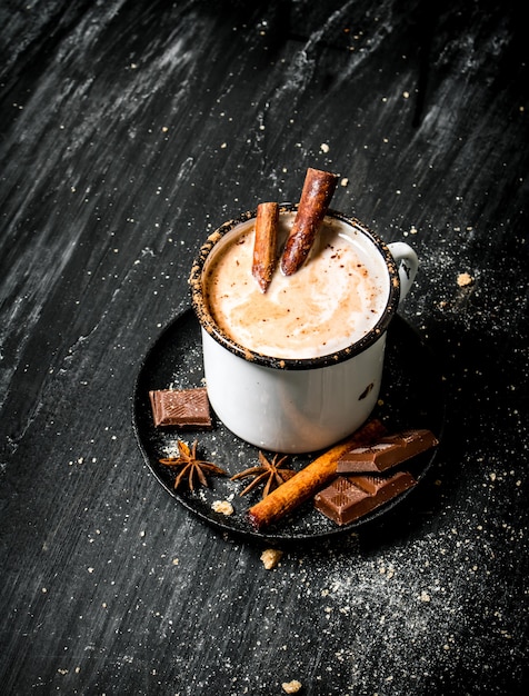 Aromatic cocoa drink with cinnamon and chocolate.