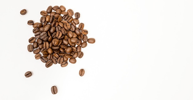 Aromatic coffee Top view of coffee beans on white