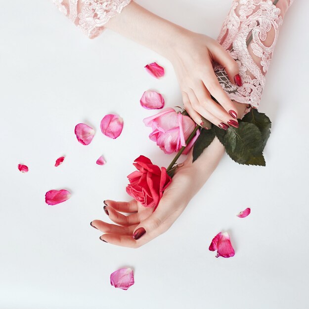 Aromatic flowers in her hand.