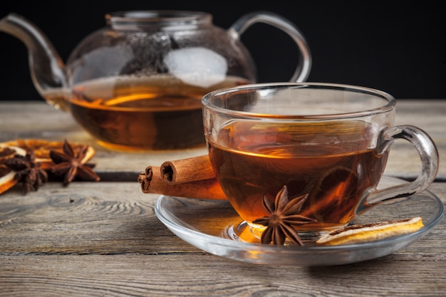 aromatic hot cinnamon tea on wooden table