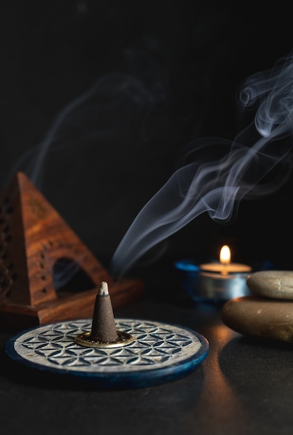aromatic incense burning on an incense burner