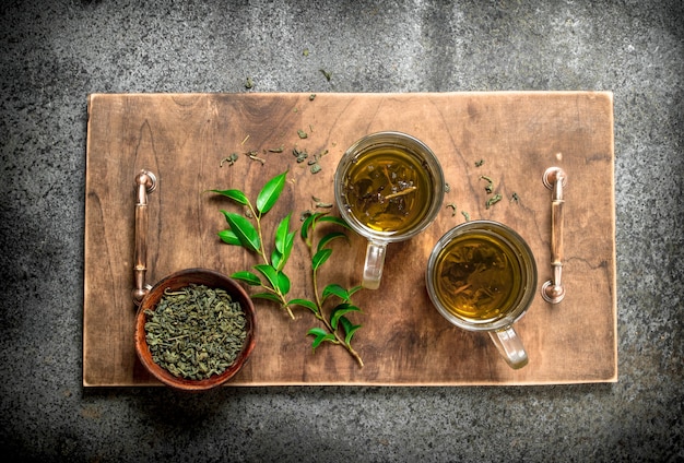 Aromatic Indian tea on rustic table.