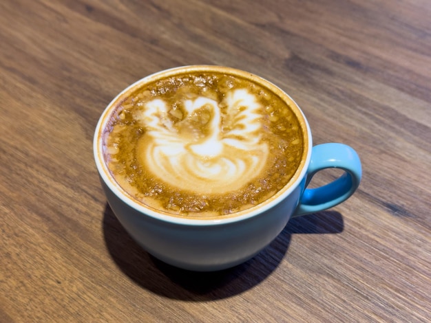 Aromatic latte with a swan pull on top