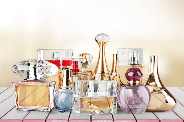 Aromatic Perfume bottles on background