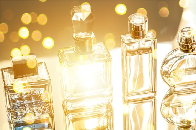 Aromatic Perfume bottles on background