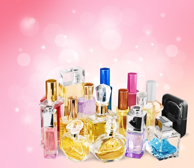 Aromatic Perfume bottles on background