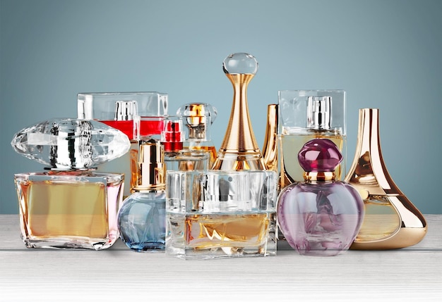 Aromatic Perfume bottles on background