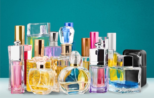 Photo aromatic perfume bottles on  background