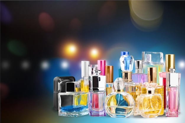 Photo aromatic perfume bottles on bright background