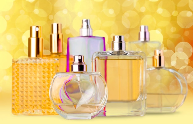 Aromatic Perfume bottles on golden background