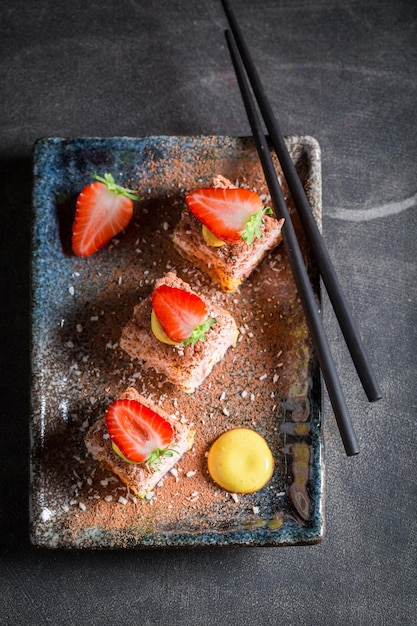 Aromatic sweet sushi sprinkled with coconut shavings