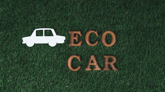 Photo arranged ecofriendly car and electric vehicle message for eco transport gyre