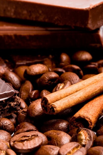 Arrangement of chocolate, coffee and cinnamon sticks