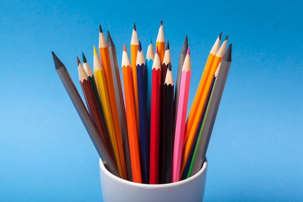 Arrangement of colorful pencils close up