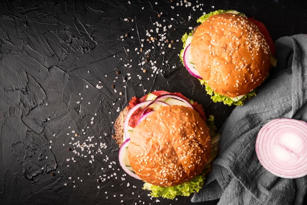 Photo arrangement of delicious hamburgers with copy space