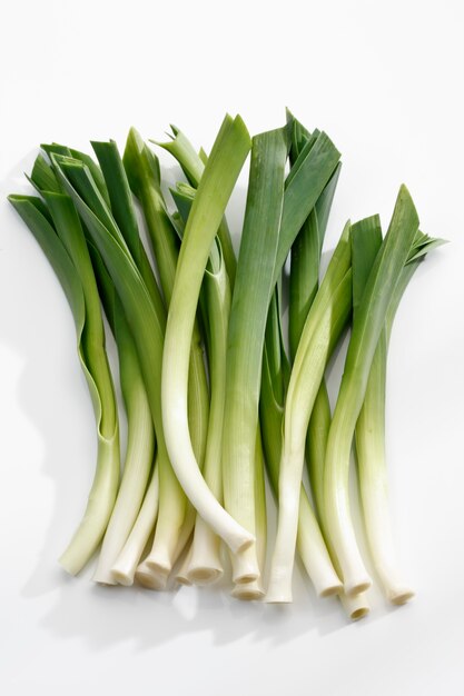 Arrangement of fresh green onions isolated