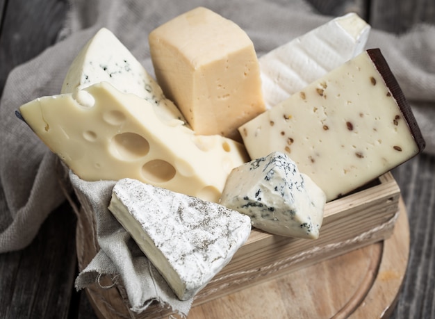 arrangement of gourmet cheeses