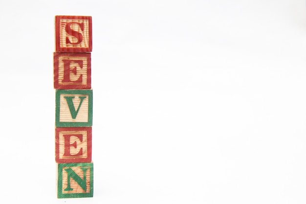 The arrangement of letters forms one word, "SEVEN"