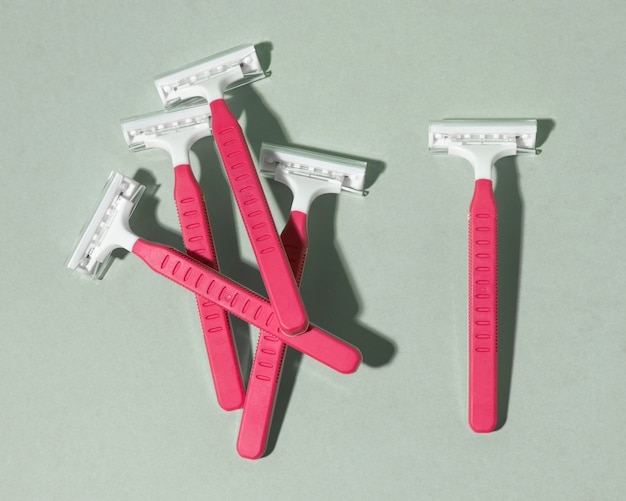 Arrangement of pink razor blades top view