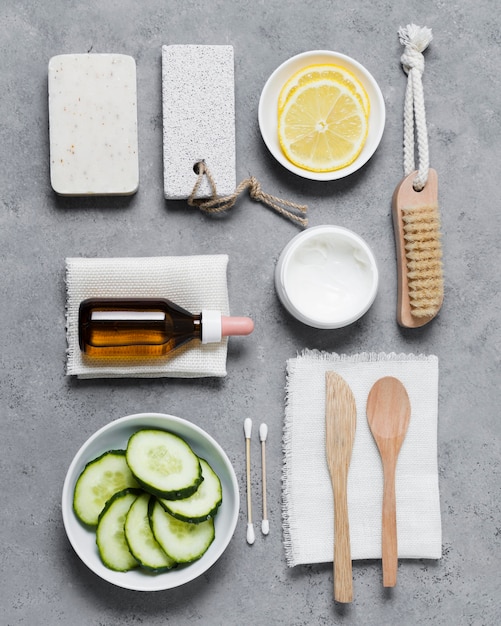 Photo arrangement of veggies and spa tools top view